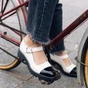 Carel Paris off white and black patent leather Mary Janes